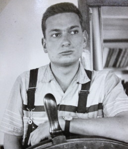 The author, age 18, reflecting at the ship's wheel.